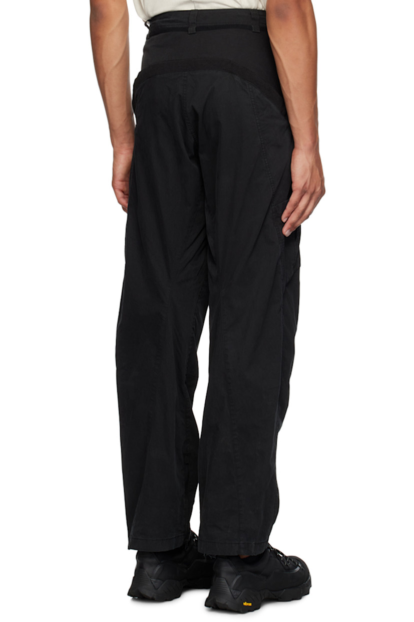 Cotton- and nylon-blend twill cargo pants.

· Paneled construction
· Belt loops at waistband and cuffs
· Four pocket styling
· Zip-fly
· Twin pleats at front
· Pleated patch pocket at knees
· Adjustable velcro tab at cuffs

Supplier color: Black