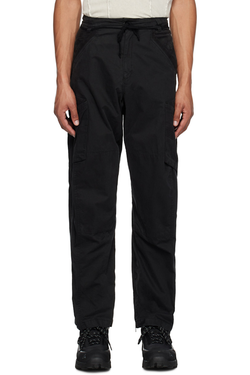Crinkled cotton- and nylon-blend taffeta trousers. Overlock stitching throughout.

· Paneled construction
· Belt loops
· Detachable self-tie belt
· Six-pocket styling
· Zip-fly
· Asymmetric patch pockets at legs
· Zip expansion panel at cuffs

Supplier color: Black