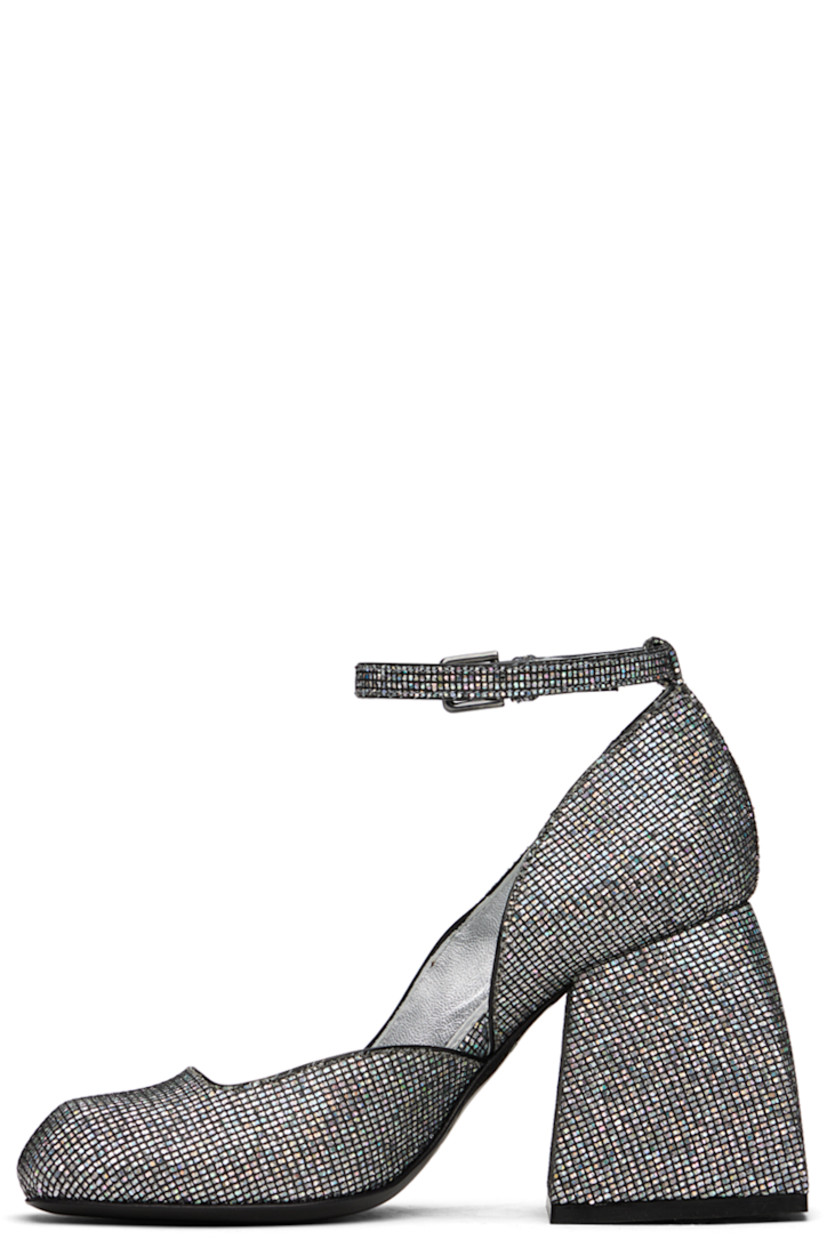 Glittered calfskin suede heels in silver-tone. 

· Square toe
· Pin-buckle ankle strap
· Logo printed at padded goatskin footbed
· Grained leather lining
· Covered block heel with rubber injection
· Leather sole
· Heel: H3.25 in

Supplier color: Glitterball