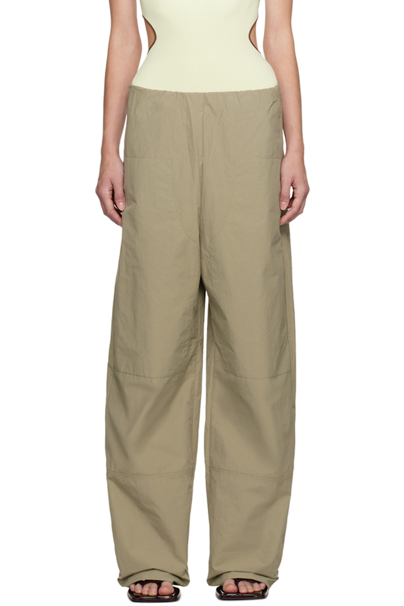 Relaxed-fit nylon- and cotton-blend taffeta track pants.

· Elasticized waistband
· Four-pocket styling

Supplier color: Clay