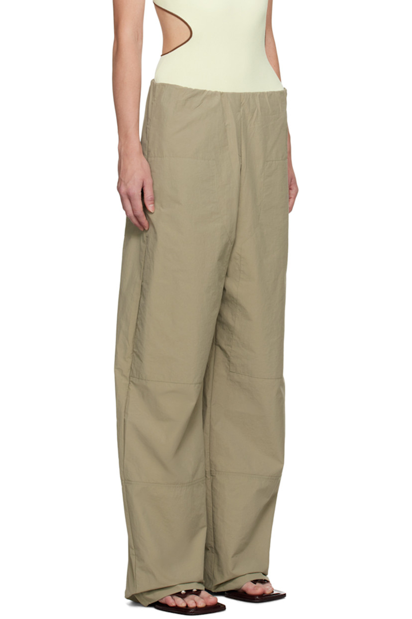 Relaxed-fit nylon- and cotton-blend taffeta track pants.

· Elasticized waistband
· Four-pocket styling

Supplier color: Clay