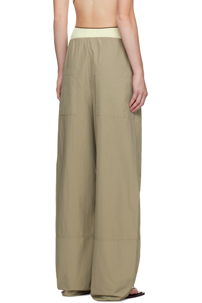 Relaxed-fit nylon- and cotton-blend taffeta track pants.

· Elasticized waistband
· Four-pocket styling

Supplier color: Clay