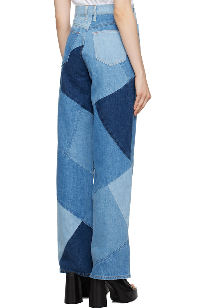 Wide-leg non-stretch denim jeans. Fading throughout.

· Patchwork construction
· High-rise
· Belt loops
· Five-pocket styling
· Zip fly
· Contrast stitching in orange

Supplier color: Blue compilation