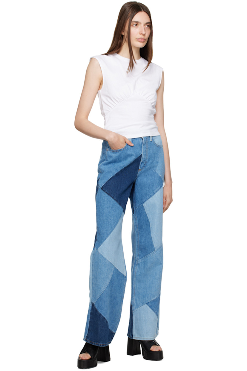 Wide-leg non-stretch denim jeans. Fading throughout.

· Patchwork construction
· High-rise
· Belt loops
· Five-pocket styling
· Zip fly
· Contrast stitching in orange

Supplier color: Blue compilation