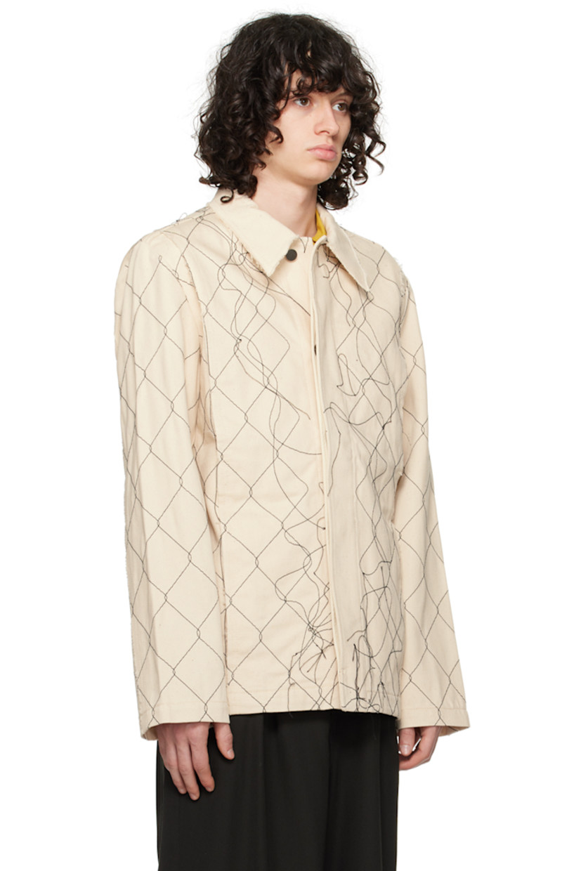 Handcrafted non-stretch organic cotton denim jacket. Embroidered graphic pattern, loose thread detailing, and raw edges throughout.

· Paneled construction
· Spread collar
· Concealed button closure
· Seam pockets
· Hand-stitched logo at back collar

Supplier color: Natural 2