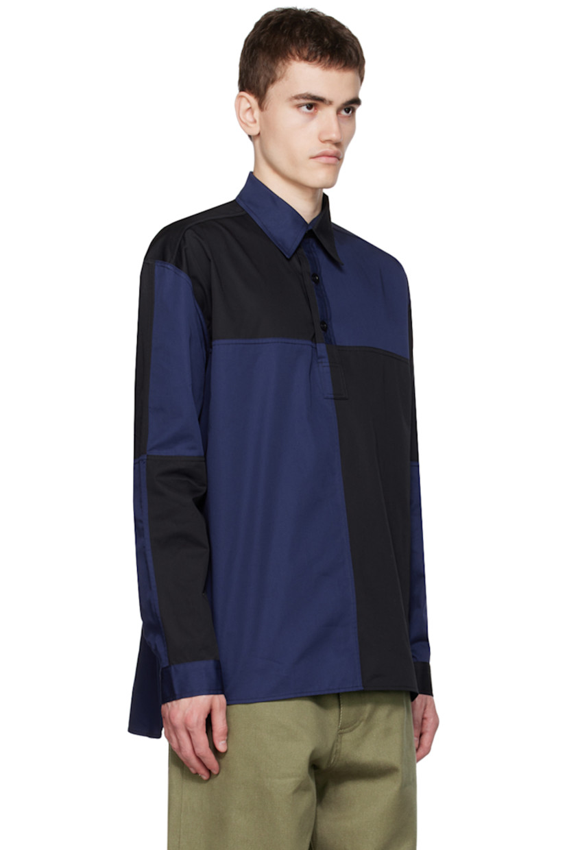 Cotton twill shirt.

· Paneled construction
· Spread collar
· Three-button placket
· Shirttail hem
· Single-button barrel cuffs

Supplier color: Black/Navy