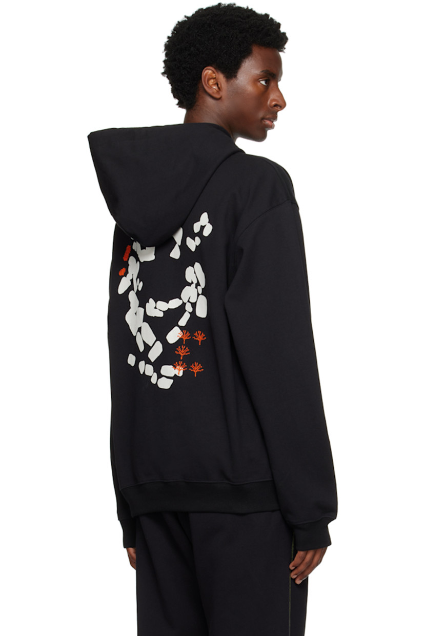 French terry hoodie. Hand-stitched tatreez embroidery and printed graphics throughout. 

· Drawstring at hood
· Kangaroo pocket
· Rib knit hem and cuffs

Supplier color: Black