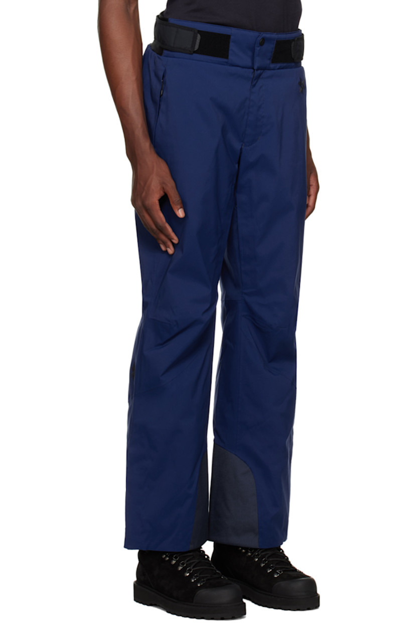 Insulated Dermizax™ polyester canvas trousers. Waterproof and breathable.

· Velcro tabs at partially elasticized waistband
· Two-pocket styling
· Zip-fly
· Logo embroidered at front pocket and back leg
· Darting at knees
· Zip vent at elasticized cuffs and inseams
· Canvas panel at inner cuffs
· Full fleece and jersey lining

Supplier color: Deep blue