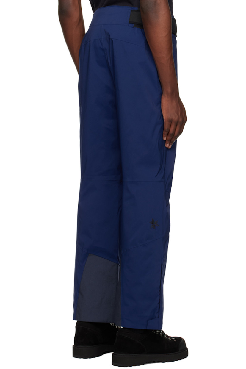 Insulated Dermizax™ polyester canvas trousers. Waterproof and breathable.

· Velcro tabs at partially elasticized waistband
· Two-pocket styling
· Zip-fly
· Logo embroidered at front pocket and back leg
· Darting at knees
· Zip vent at elasticized cuffs and inseams
· Canvas panel at inner cuffs
· Full fleece and jersey lining

Supplier color: Deep blue