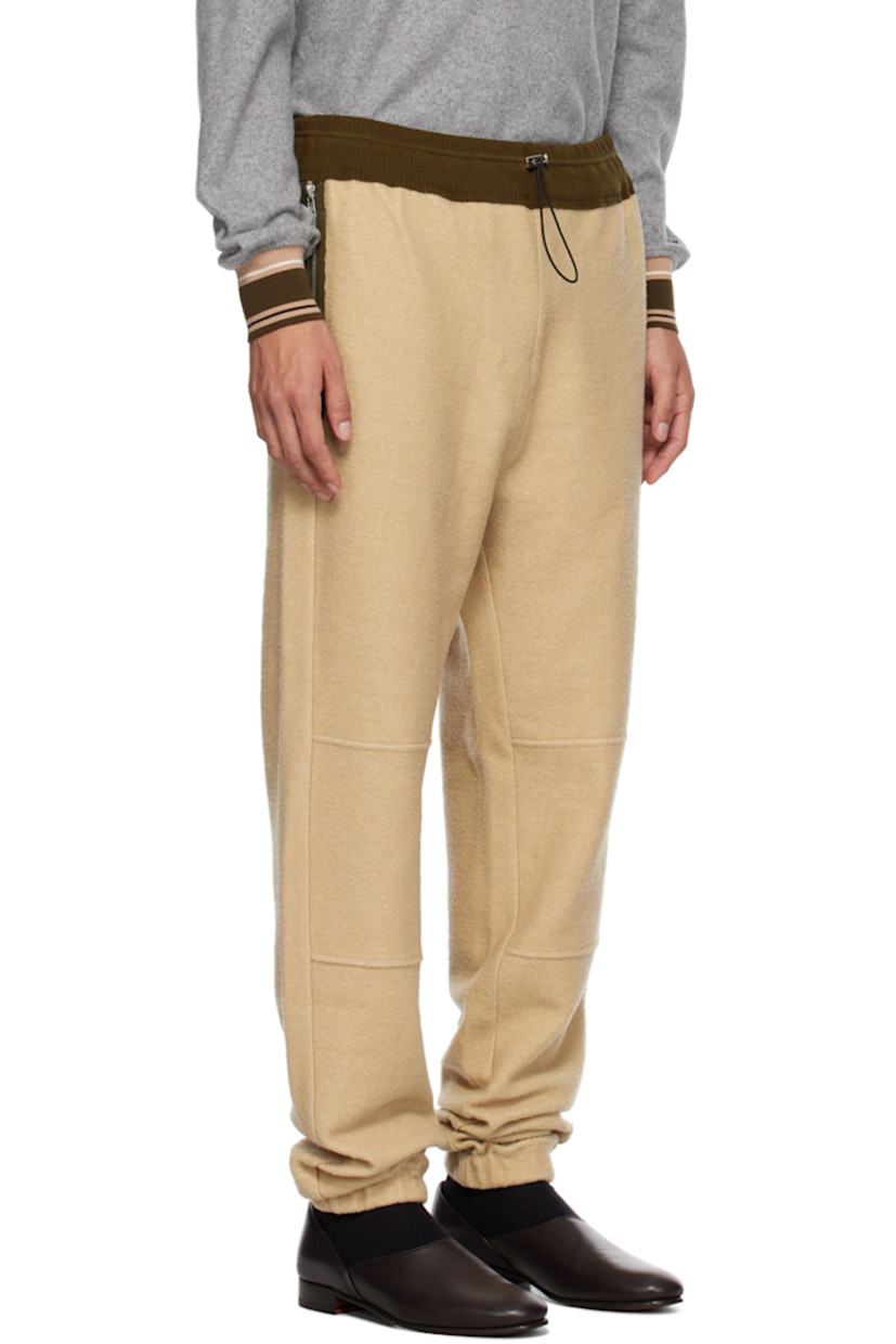Felted purl knit wool- and cotton-blend sweatpants. 

· Bungee-style drawstring at elasticized waistband
· Three-pocket styling
· Elasticized cuffs
 
Supplier color: Sand