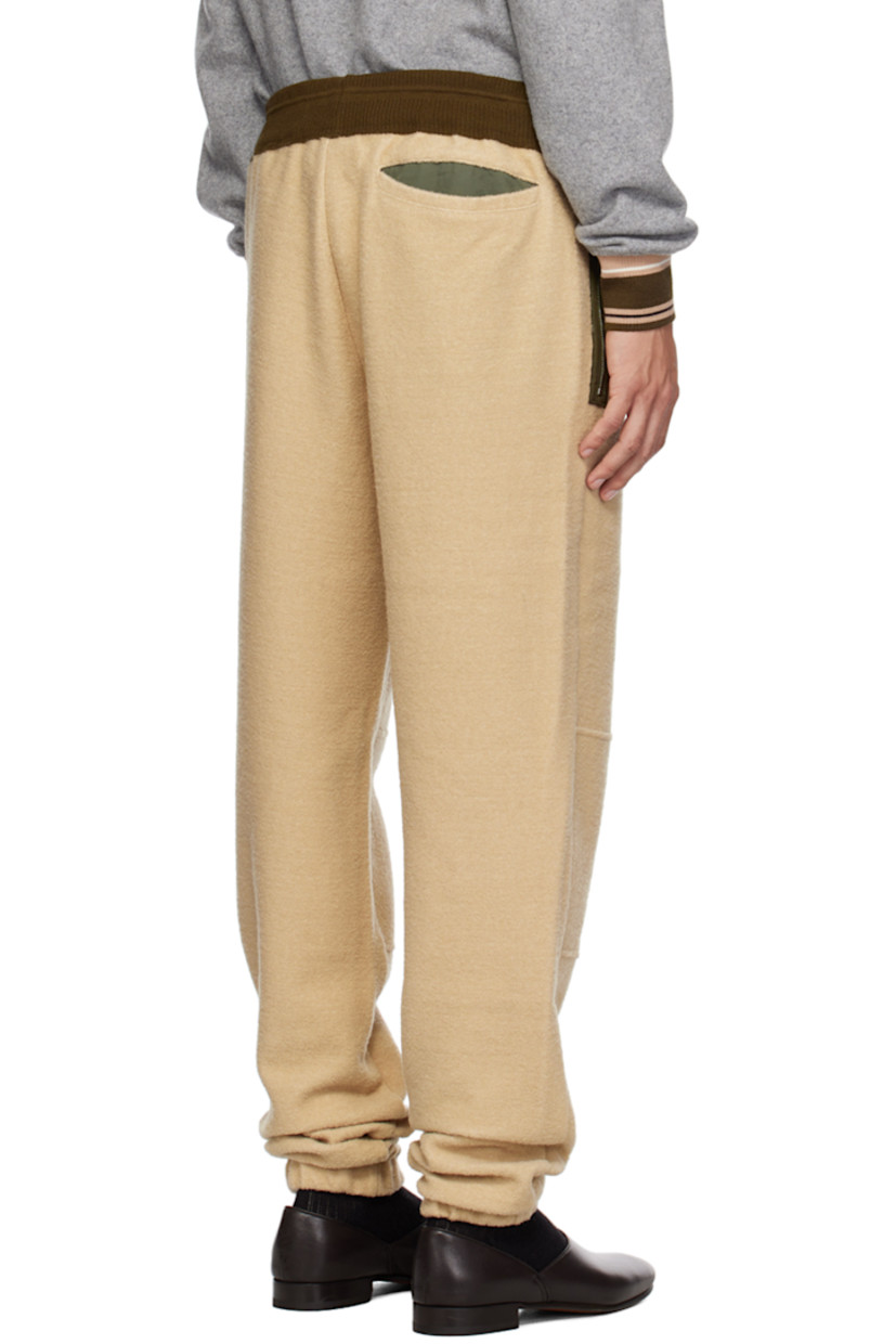 Felted purl knit wool- and cotton-blend sweatpants. 

· Bungee-style drawstring at elasticized waistband
· Three-pocket styling
· Elasticized cuffs
 
Supplier color: Sand