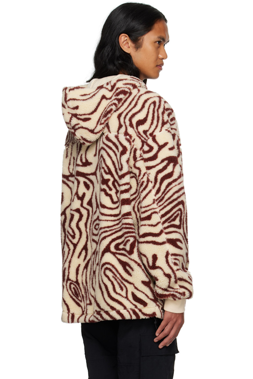 Sherpa fleece jacket. Graphic pattern printed throughout.

· Stand collar
· Zip closure
· Logo patch at chest
· Patch pockets
· Concealed bungee-style drawstring at hem
· Dropped shoulders
· Rib knit cuffs
· Full mesh lining
· Logo-engraved black hardware

Supplier color: Ecru/Burgundy