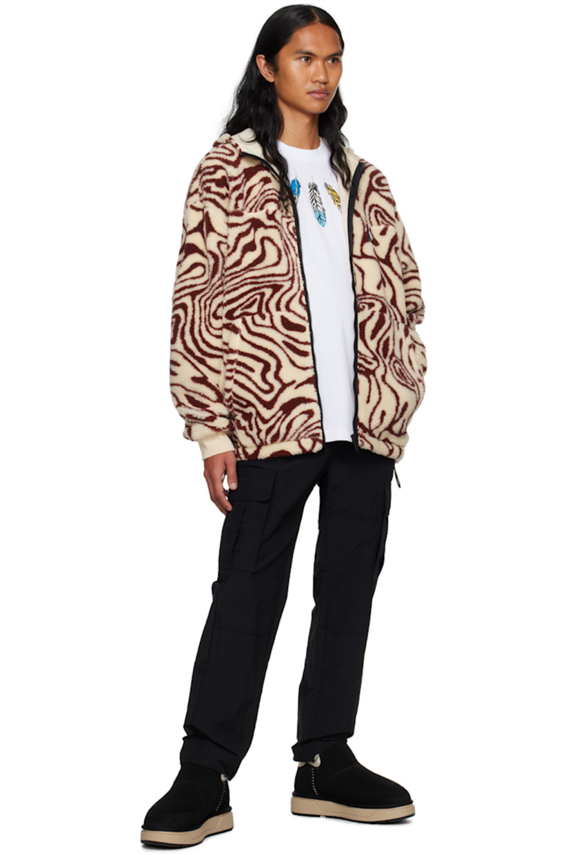 Sherpa fleece jacket. Graphic pattern printed throughout.

· Stand collar
· Zip closure
· Logo patch at chest
· Patch pockets
· Concealed bungee-style drawstring at hem
· Dropped shoulders
· Rib knit cuffs
· Full mesh lining
· Logo-engraved black hardware

Supplier color: Ecru/Burgundy