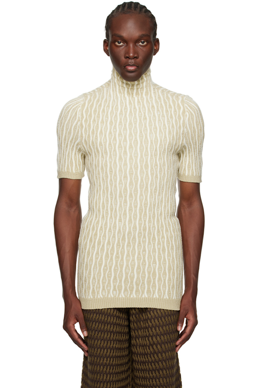 Handcrafted knit stretch acrylic bouclé T-shirt. Stripes throughout.

· Rib knit turtleneck, hem, and cuffs
· Logo flag at back hem

Supplier color: Calico