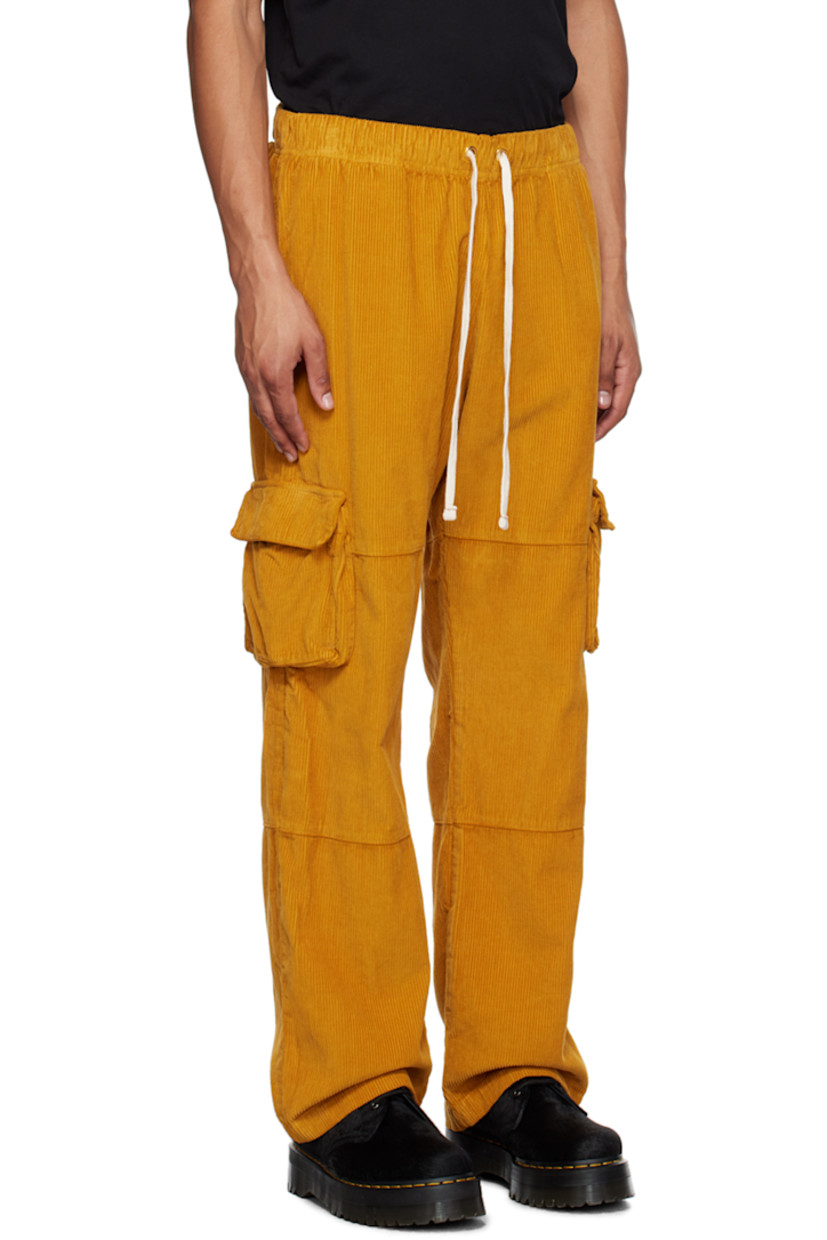 Wide-leg garment-dyed cotton corduroy cargo pants. 

· Pre-shrunk
· Drawstring at elasticized waistband
· Three-pocket styling
· Flap pocket at outseams 

Supplier color: Mustard