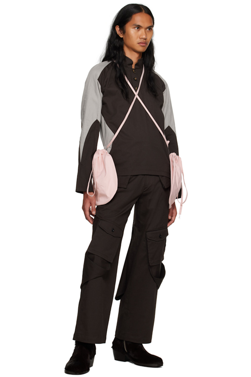 Stretch cotton twill polo.

· Paneled construction
· Mock neck
· Three-button placket
· Self-tie criss-crossing straps at front and back
· Loop and integrated pouch at side seams
· Saddle shoulders

Supplier color: Black/Grey/Pink
