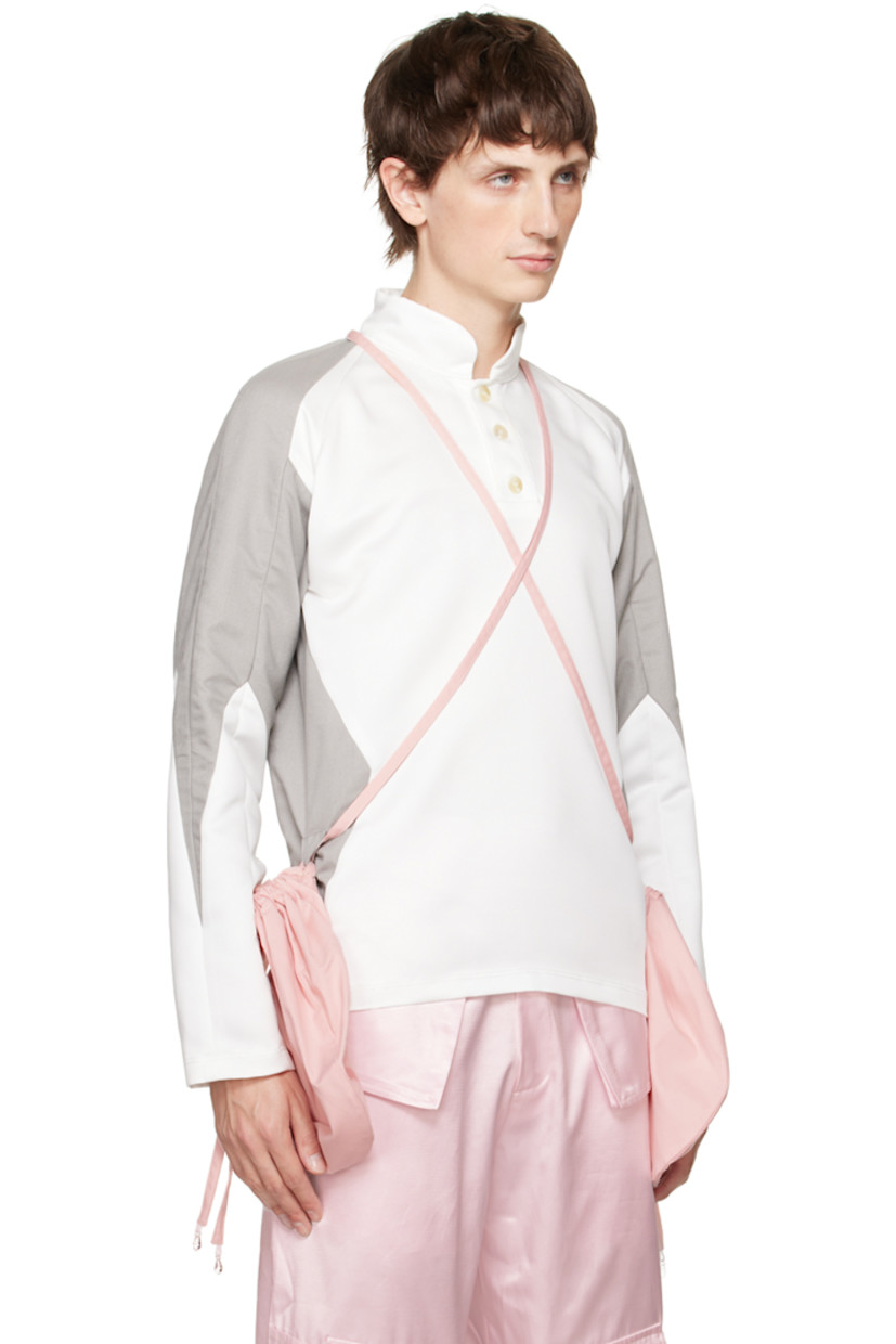 Polyester twill and stretch cotton twill polo. Detachable drawstring pouches with crisscrossing straps. 

· Paneled construction
· Band collar
· Three-button placket
· Raglan sleeves

Available exclusively at SSENSE. 

Supplier color: Pink/Grey/White