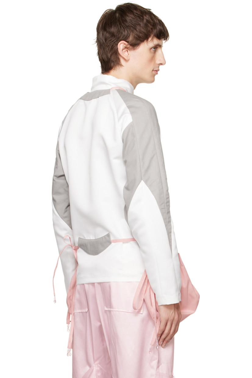 Polyester twill and stretch cotton twill polo. Detachable drawstring pouches with crisscrossing straps. 

· Paneled construction
· Band collar
· Three-button placket
· Raglan sleeves

Available exclusively at SSENSE. 

Supplier color: Pink/Grey/White