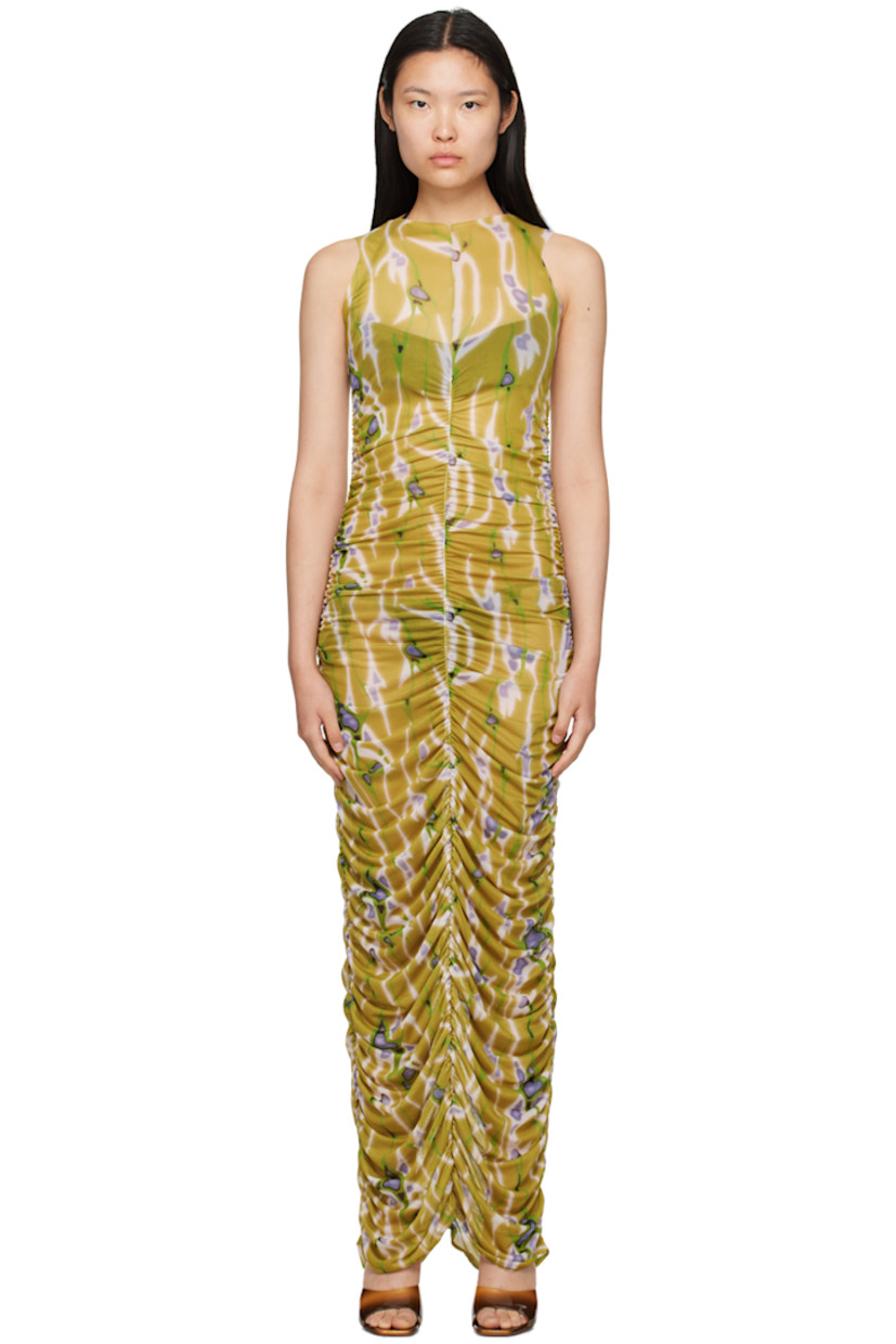 Handcrafted semi-sheer stretch polyester mesh dress. Ruching and graphic pattern printed throughout.

· Raw edge at round neck
· Central seam at front and back

Supplier color: Tomillo