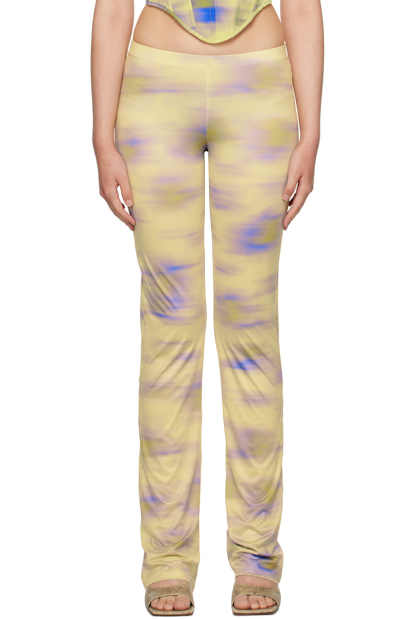 Handcrafted stretch polyester jersey trousers. Graphic pattern printed throughout.

· Elasticized waistband
· Unlined

Supplier color: Cayena