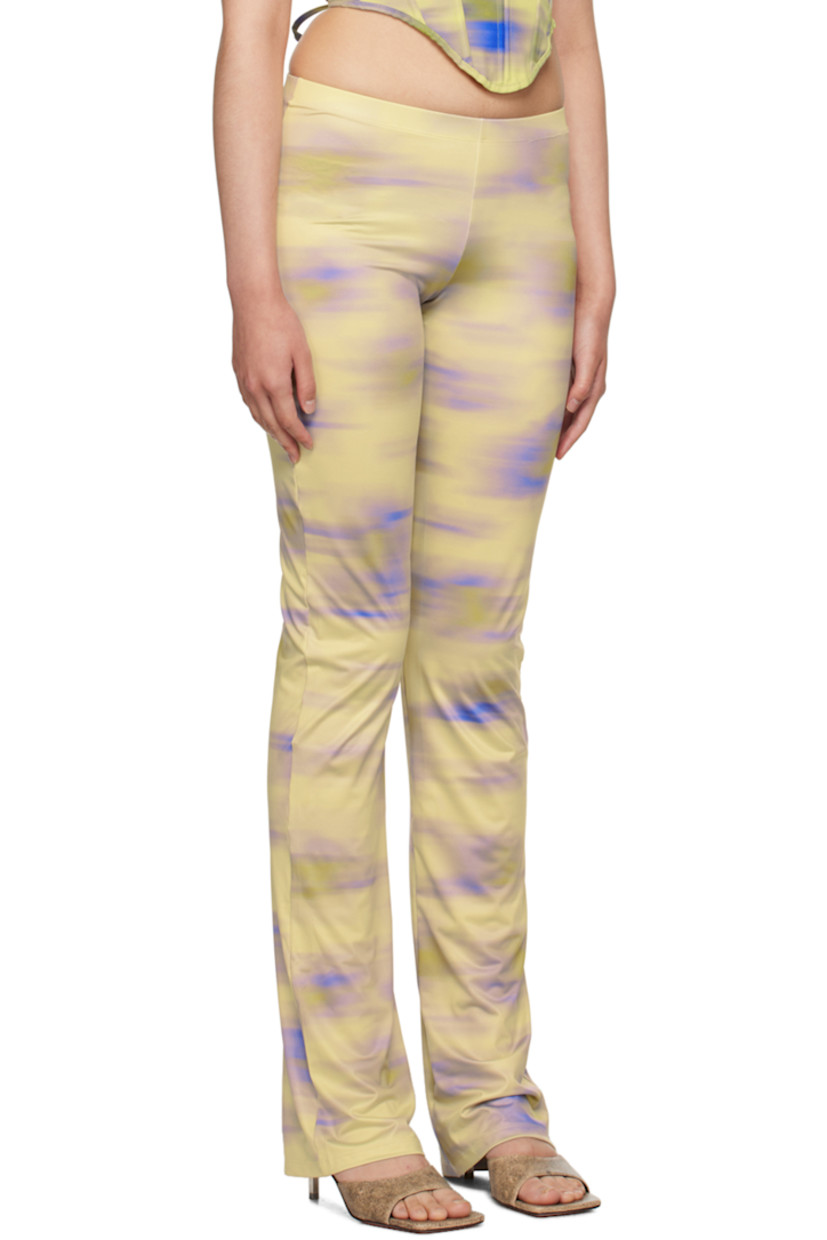 Handcrafted stretch polyester jersey trousers. Graphic pattern printed throughout.

· Elasticized waistband
· Unlined

Supplier color: Cayena