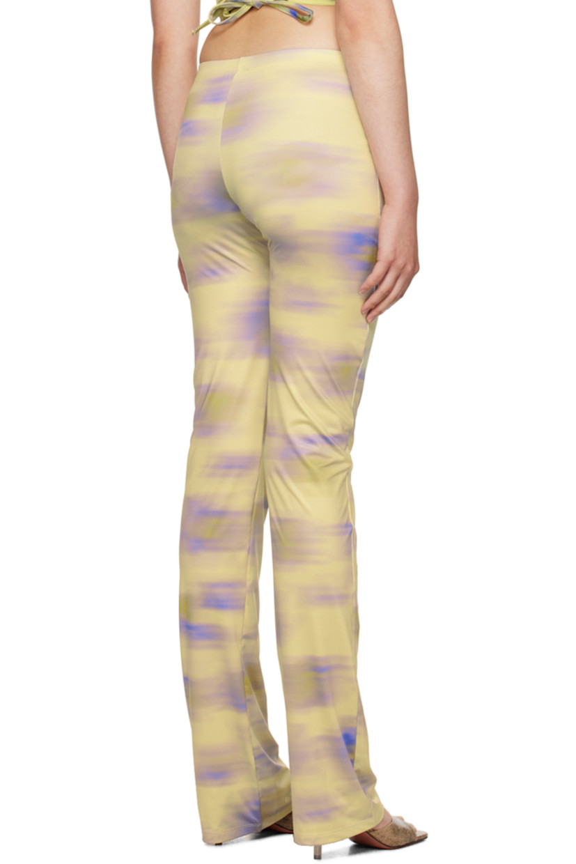 Handcrafted stretch polyester jersey trousers. Graphic pattern printed throughout.

· Elasticized waistband
· Unlined

Supplier color: Cayena