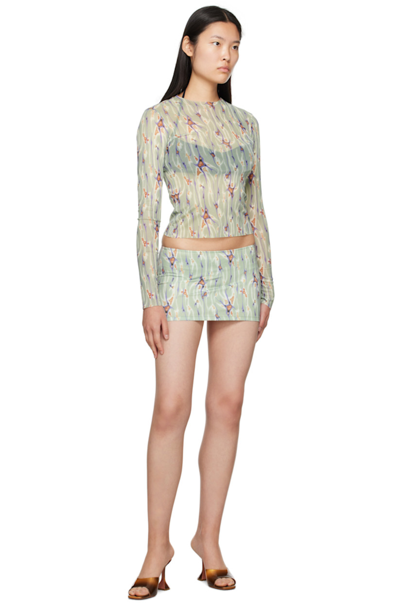 Handcrafted stretch polyester jersey skirt. Graphic pattern printed throughout.

· Elasticized waistband
· Unlined

Supplier color: Clavo