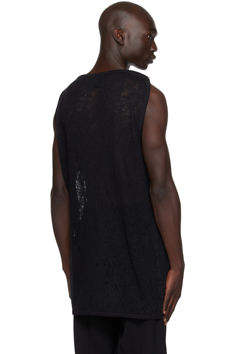 Handcrafted semi-sheer knit wool tank top. Rib knit boat neck, hem, and armscyes.

This item is part of a limited run of 15.

Supplier color: Black