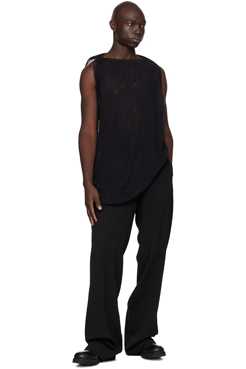 Handcrafted semi-sheer knit wool tank top. Rib knit boat neck, hem, and armscyes.

This item is part of a limited run of 15.

Supplier color: Black
