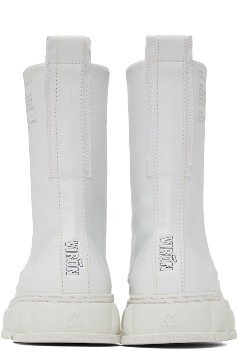 Handcrafted ankle-high PETA-certified buffed Appleskin™ faux-leather boots in white. Text printed at outer side.

· Lace-up and zip closure
· Logo printed at tongue
· Pull-loop at heel collar
· Logo embossed at heel counter
· Twill lining
· Textured rubber midsole
· Treaded rubber outsole

Supplier color: White