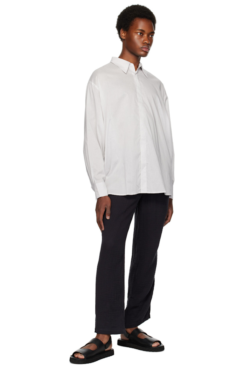 Handcrafted loose-fit cotton gauze sweatpants.

· Concealed drawstring at elasticized waistband
· Three-pocket styling

Supplier color: Black angel
