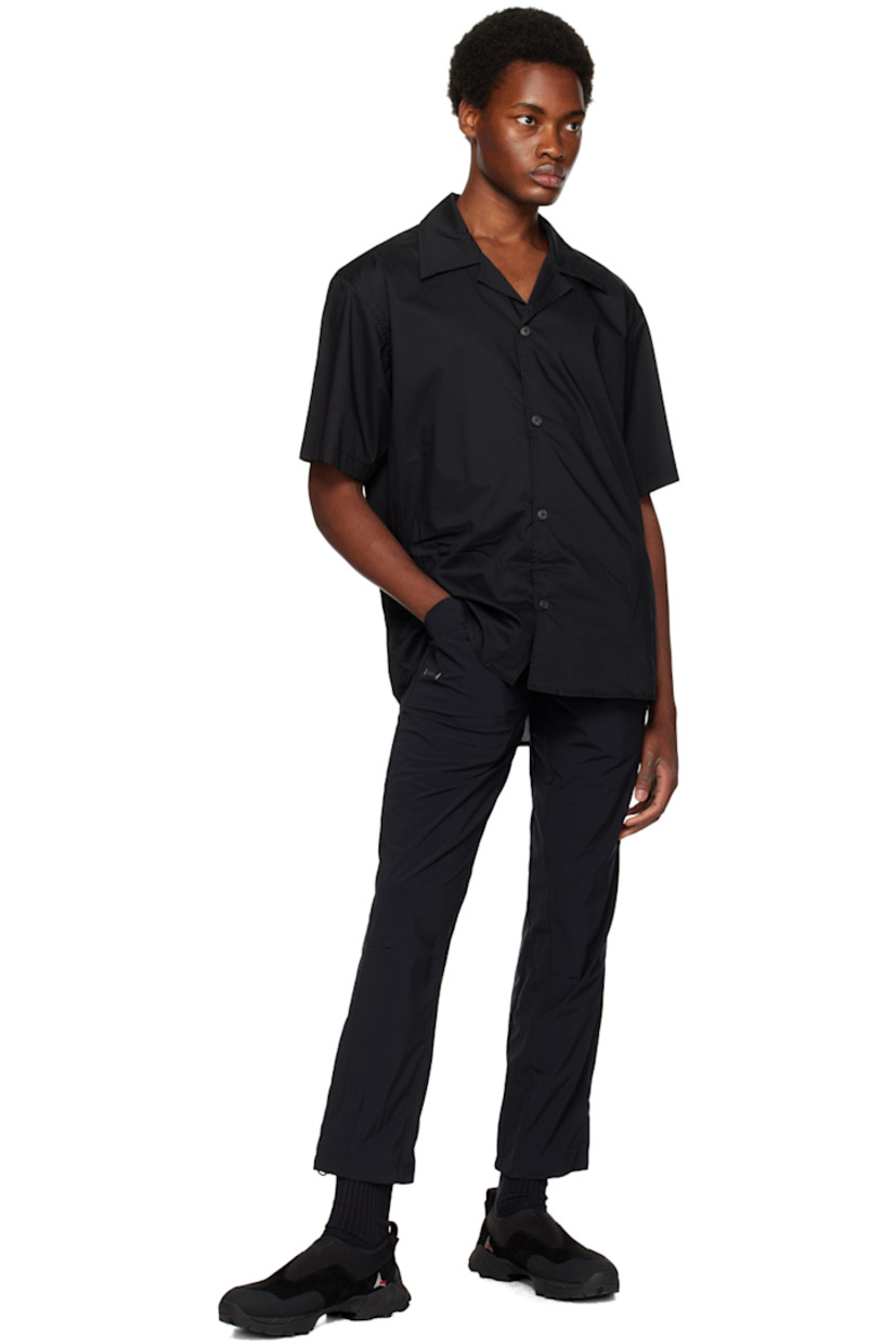 Handcrafted straight-leg stretch regenerated nylon taffeta track pants. Wind-resistant and water-repellent.

· Concealed drawstring at elasticized waistband
· Three-pocket styling
· Mock-fly
· Logo patch at front
· Pleated knees
· Bungee-style drawstring at cuffs

Supplier color: Cosmic
