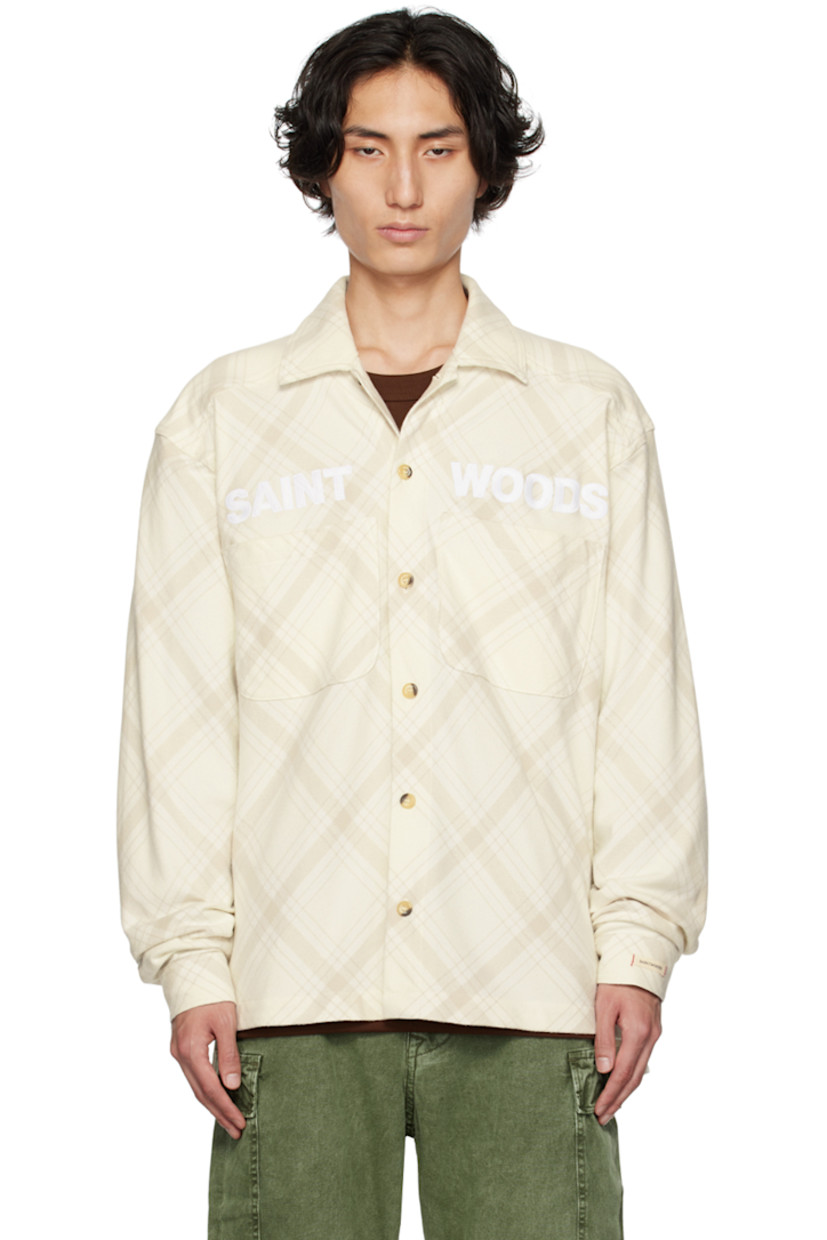 Cotton flannel shirt. Check pattern throughout.

· Spread collar
· Button closure
· Logo embroidered at front
· Patch pockets
· Vented side seams
· Logo flag at side seam
· Single-button barrel cuffs
· Tortoiseshell hardware

Supplier color: Bone