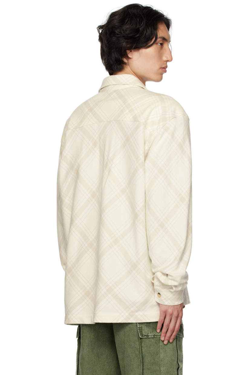 Cotton flannel shirt. Check pattern throughout.

· Spread collar
· Button closure
· Logo embroidered at front
· Patch pockets
· Vented side seams
· Logo flag at side seam
· Single-button barrel cuffs
· Tortoiseshell hardware

Supplier color: Bone