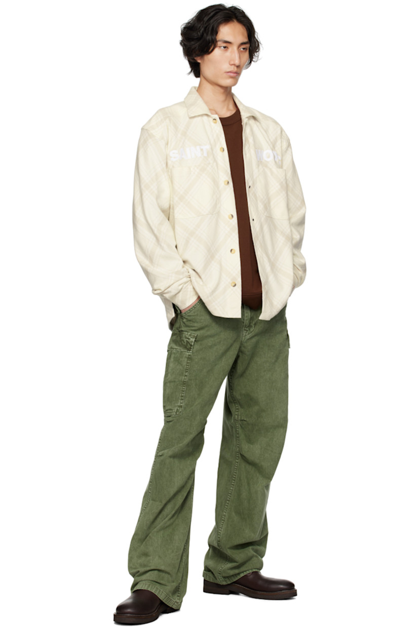 Cotton flannel shirt. Check pattern throughout.

· Spread collar
· Button closure
· Logo embroidered at front
· Patch pockets
· Vented side seams
· Logo flag at side seam
· Single-button barrel cuffs
· Tortoiseshell hardware

Supplier color: Bone