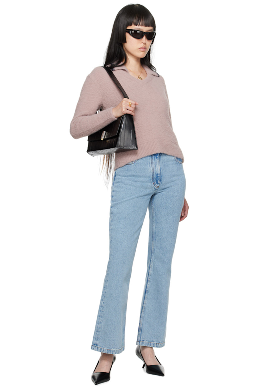 Flared non-stretch organic cotton denim jeans.

· Belt loops
· Five-pocket styling
· Zip-fly
· Leather logo patch at back waistband
· Logo-engraved silver-tone hardware
· Contrast stitching in tan

Supplier color: Light blue organic denim