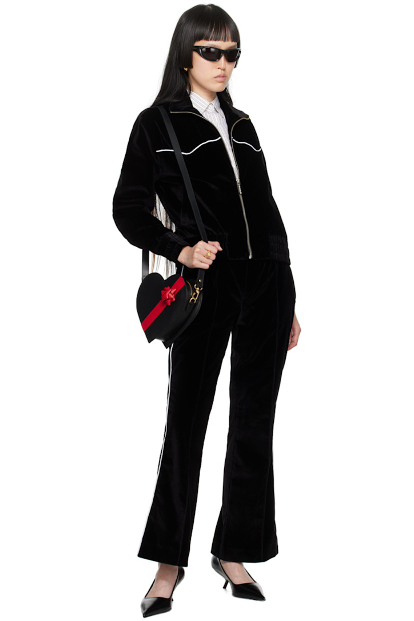 Flared stretch cotton velour lounge pants.

· Elasticized waistband
· Four-pocket styling
· Pinched seams at front and back legs
· Piping at outseams

Supplier color: Black