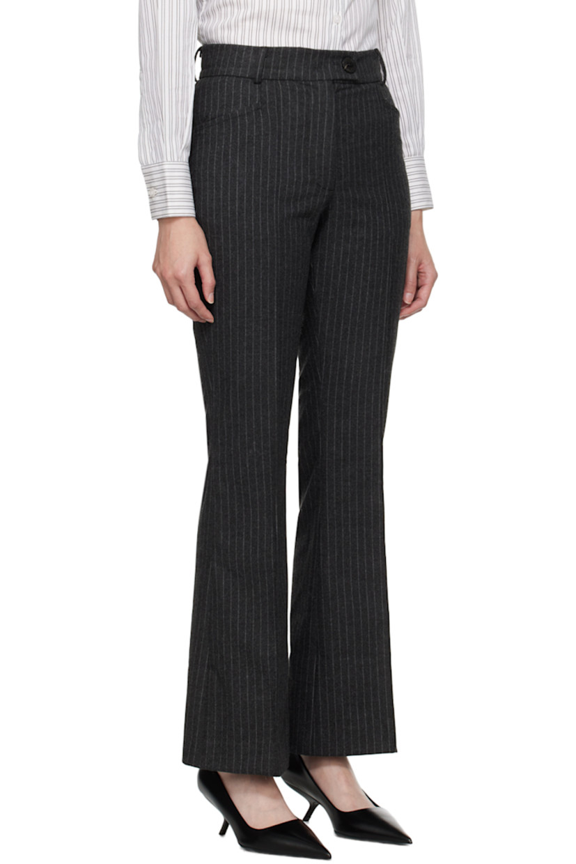 Felted stretch polyester- and viscose-blend twill trousers. Pinstripes throughout.

· Belt loops
· Four-pocket styling
· Zip-fly
· Creased legs
· Flared cuffs
· Logo-engraved hardware 

Supplier color: Grey pin stripe
