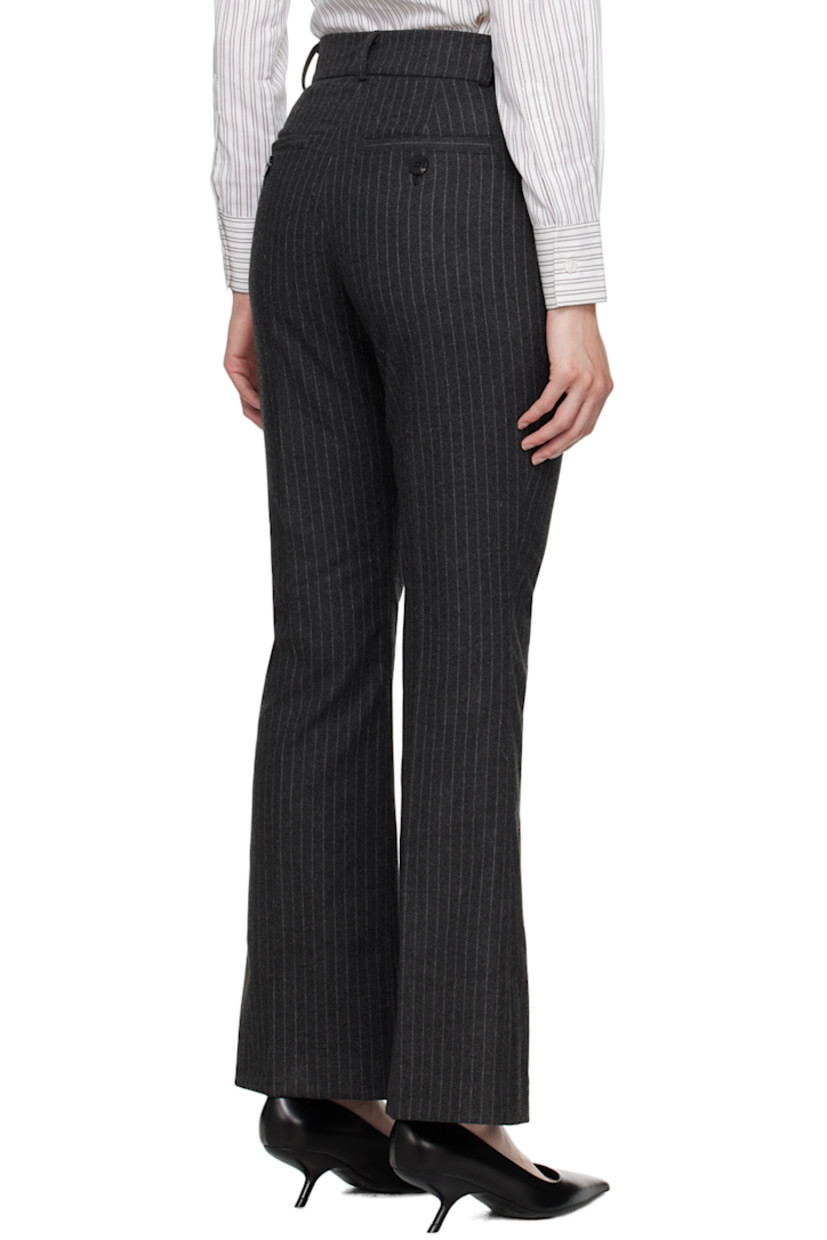 Felted stretch polyester- and viscose-blend twill trousers. Pinstripes throughout.

· Belt loops
· Four-pocket styling
· Zip-fly
· Creased legs
· Flared cuffs
· Logo-engraved hardware 

Supplier color: Grey pin stripe