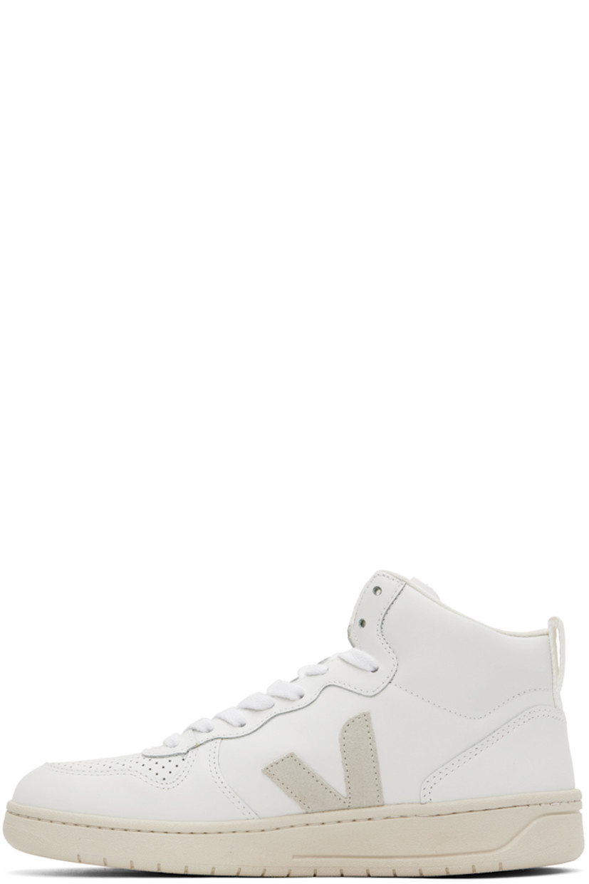 High-top buffed leather sneakers in white.

· Perforated detailing at toe
· Lace-up closure
· Logo embossed at padded tongue
· Pull-loop at padded collar
· Suede logo appliqué at sides
· Recycled mesh lining
· Treaded rubber sole

Supplier color: Extra white/Natural