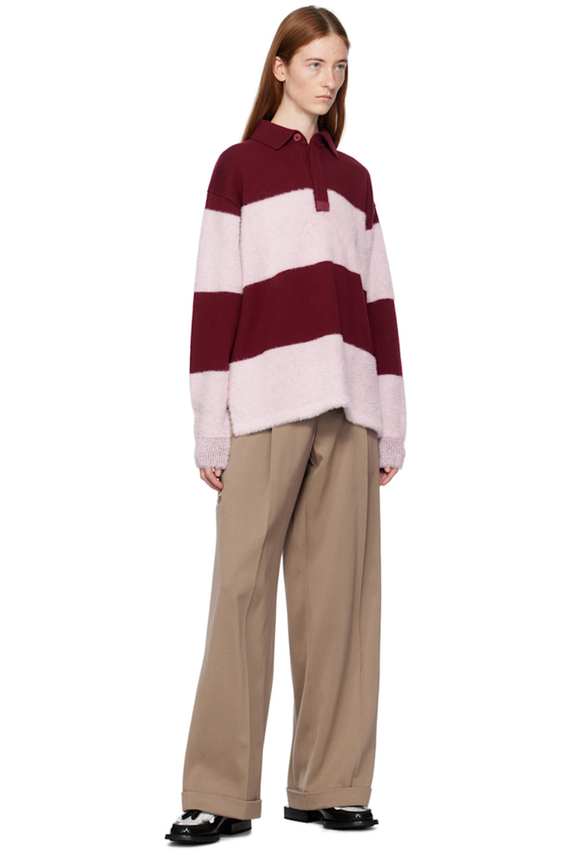 Wide-leg heavyweight cotton twill trousers. 

· High-rise
· Belt loops
· Four-pocket styling
· Zip-fly
· S-hook at pleated front
· Creased legs 
· Rolled cuffs
· Welt pocket at outseam 

Supplier color: Porcini