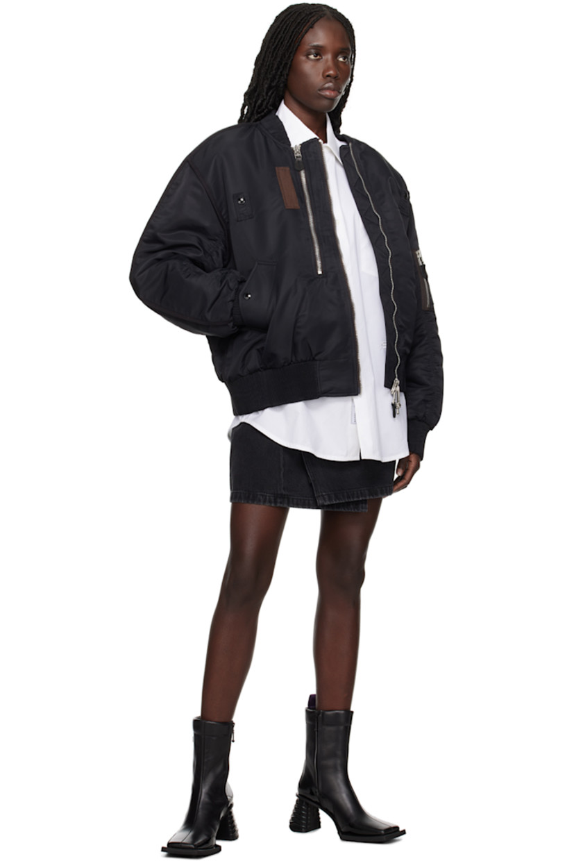 Non-stretch denim skirt. Fading throughout.

· Offset zip closure
· Logo embossed at back
· Full stretch satin lining

Supplier color: Stone black