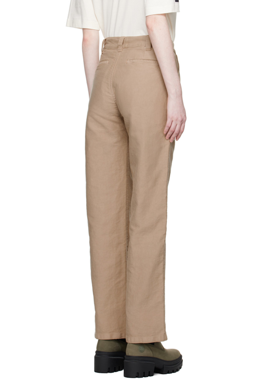 Organic cotton canvas trousers.

· Belt loops and keyring at waistband
· Four-pocket styling
· Zip-fly
· Flap pocket at leg
· Logo-engraved silver-tone hardware

Supplier color: Dyed sand used