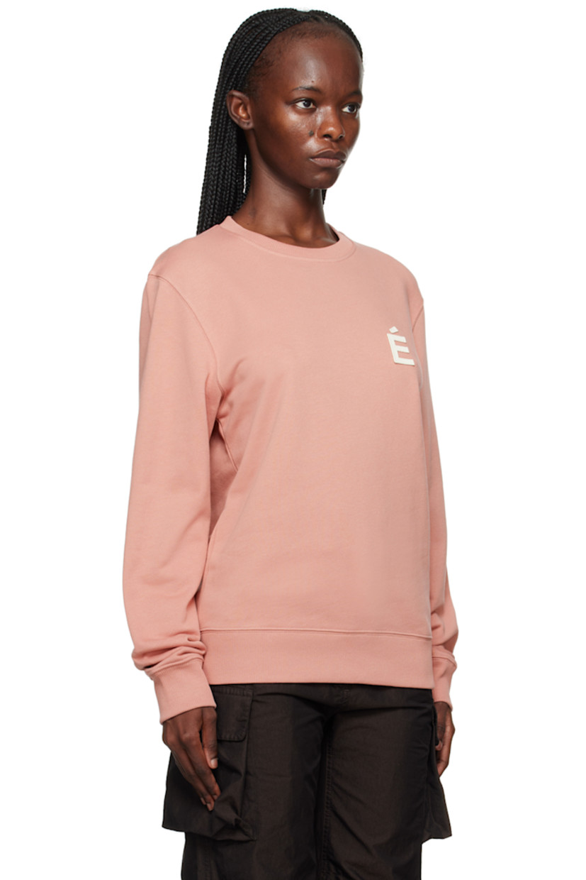 Organic cotton French terry sweatshirt.

· Rib knit crewneck, hem, and cuffs
· Logo patch at chest

Supplier color: Pink