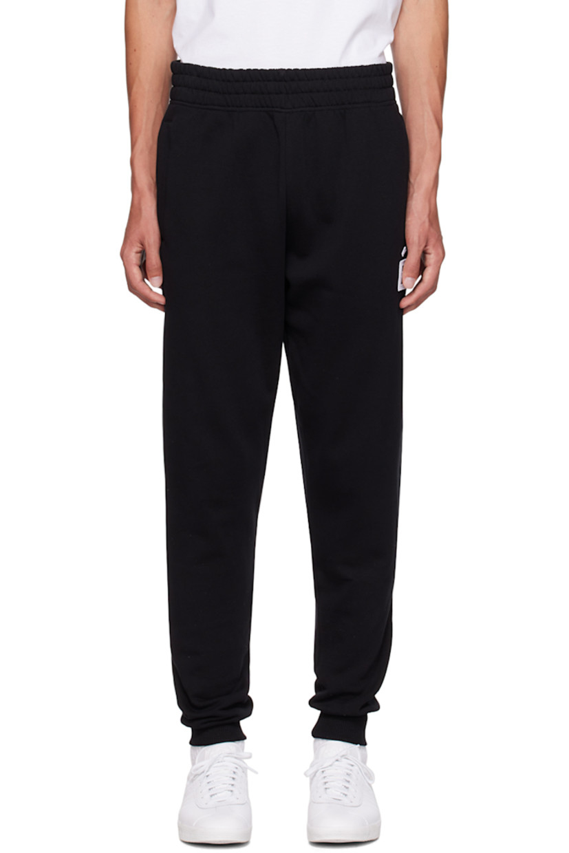 Relaxed-fit 340 g organic cotton fleece sweatpants.

· Concealed drawstring at elasticized waistband
· Two-pocket styling
· Logo patch at front
· Rib knit cuffs

Supplier color: Black