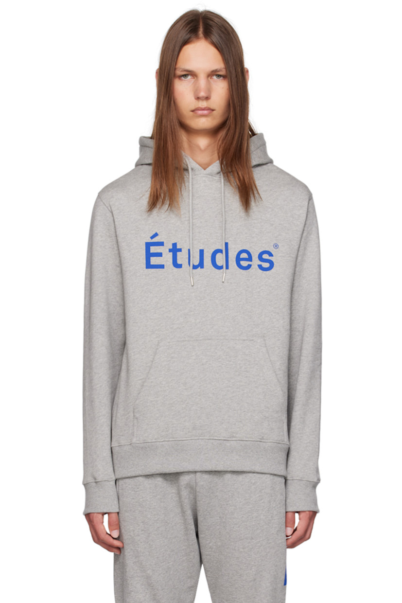 Mottled organic cotton fleece hoodie.

· Drawstring at hood
· Logo printed at front
· Kangaroo pocket
· Rib knit hem and cuffs

Supplier color: Heather grey