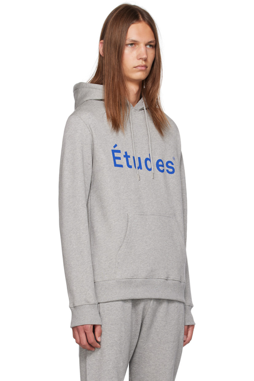 Mottled organic cotton fleece hoodie.

· Drawstring at hood
· Logo printed at front
· Kangaroo pocket
· Rib knit hem and cuffs

Supplier color: Heather grey
