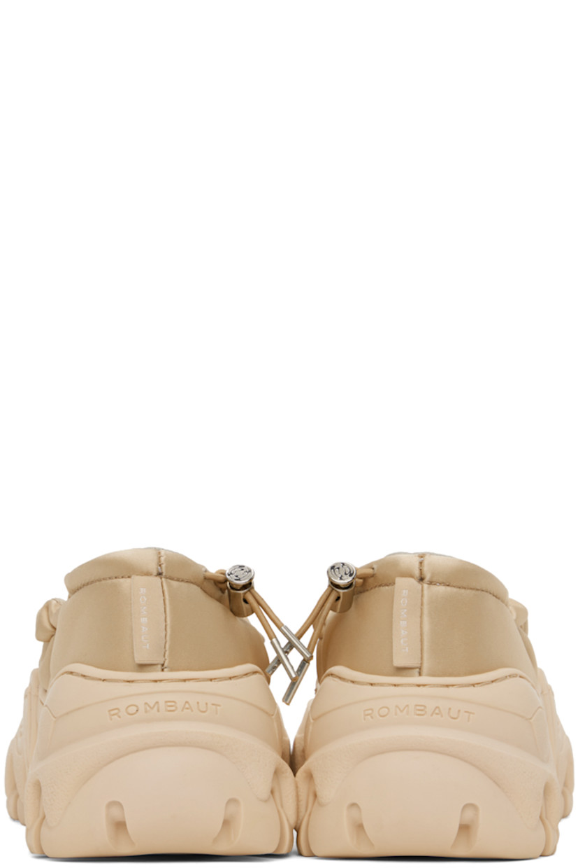 Handcrafted satin ballerina flats in beige.

· Bungee-style drawstring at elasticized collar
· Logo flag at heel counter
· Mesh lining
· Sculptural TPU platform midsole
· Treaded TPU outsole
· Logo-engraved silver-tone hardware
· Platform: H1.5 in

Available exclusively at SSENSE.

Supplier color: Cream