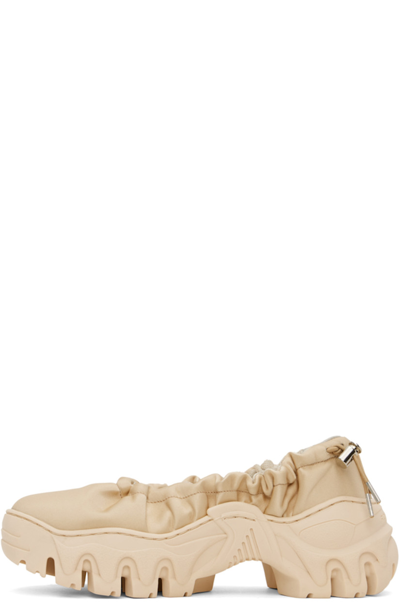 Handcrafted satin ballerina flats in beige.

· Bungee-style drawstring at elasticized collar
· Logo flag at heel counter
· Mesh lining
· Sculptural TPU platform midsole
· Treaded TPU outsole
· Logo-engraved silver-tone hardware
· Platform: H1.5 in

Available exclusively at SSENSE.

Supplier color: Cream