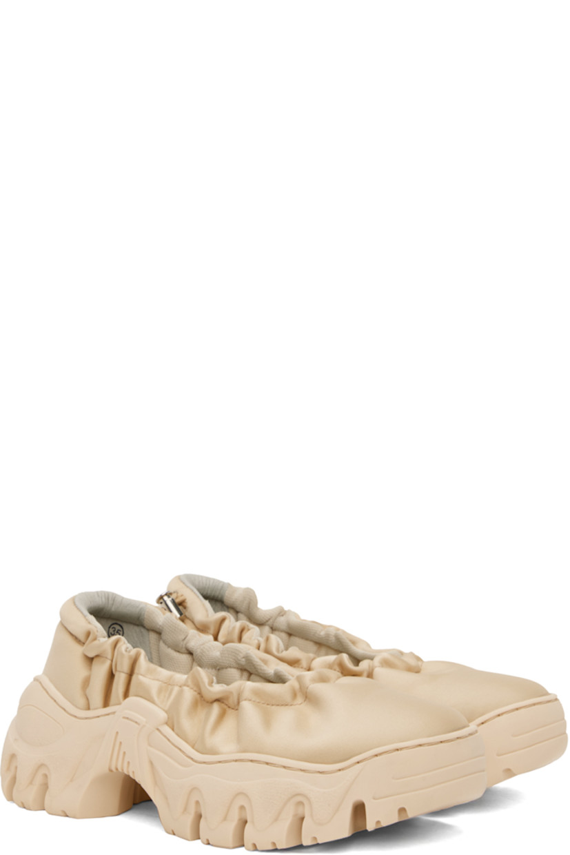 Handcrafted satin ballerina flats in beige.

· Bungee-style drawstring at elasticized collar
· Logo flag at heel counter
· Mesh lining
· Sculptural TPU platform midsole
· Treaded TPU outsole
· Logo-engraved silver-tone hardware
· Platform: H1.5 in

Available exclusively at SSENSE.

Supplier color: Cream